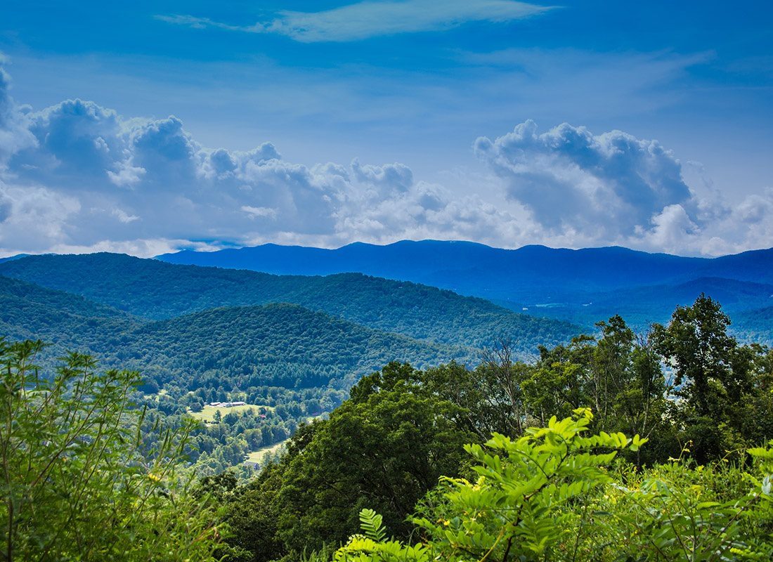 Contact - Aerial View of Stormy Skies Over Blue Ridge Mountains